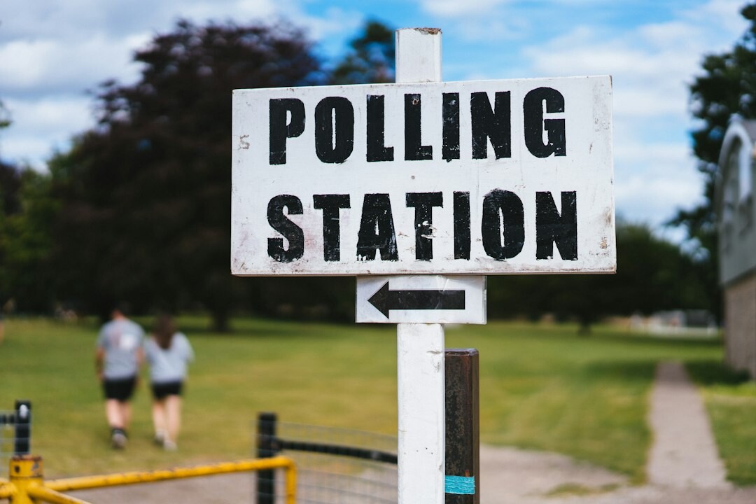 people voting in polling station