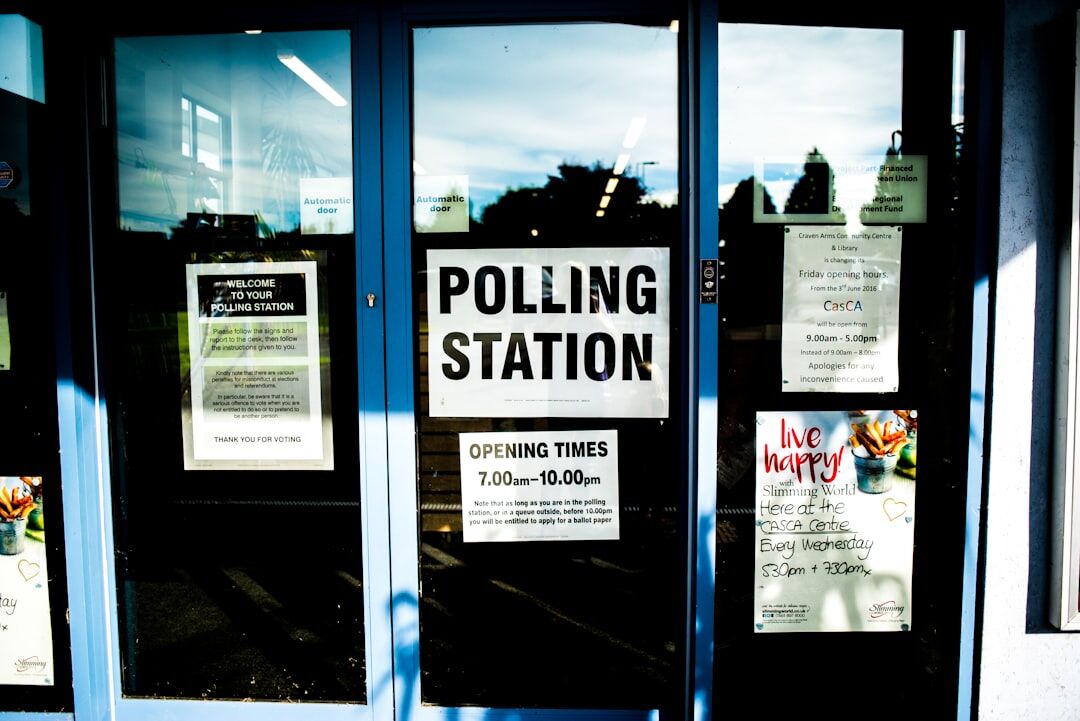 people voting in polling station